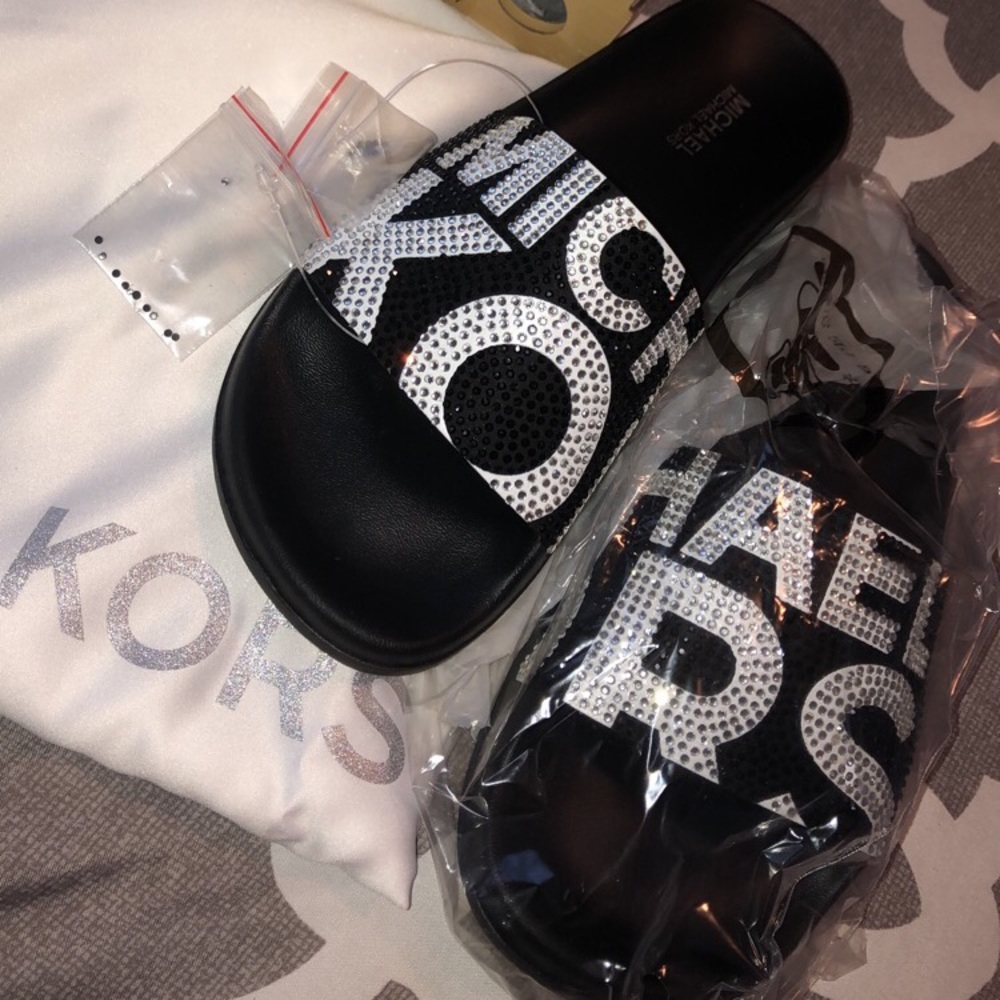 Brand new never worn Michael Kors slides size 5